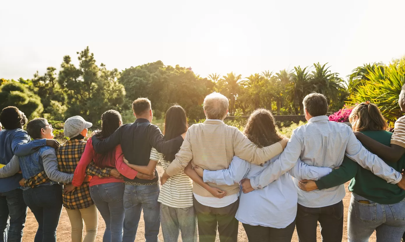 Group of people hugging in a line